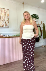 cocoa coloured skirt with white dots styled casually with tee outfit