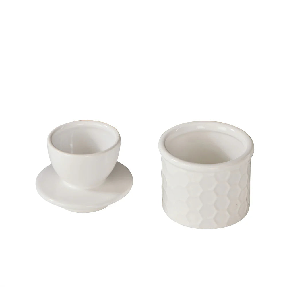 Stoneware butter keeper styled on kitchen bench countertop