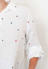 Women’s white linen shirt styled with denim casual outfit