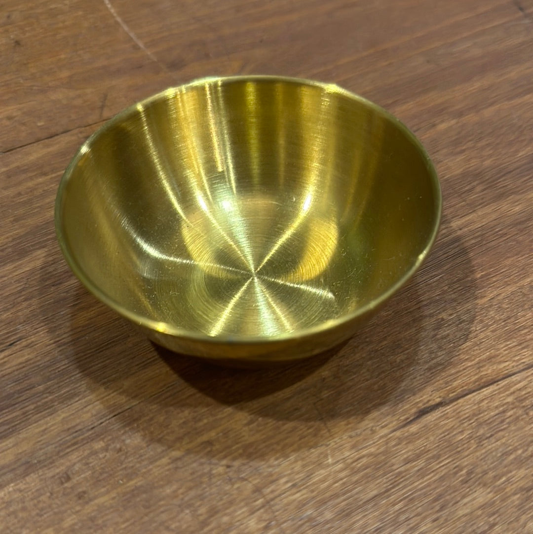 Small gold bowl for mixing clay face masks skincare routine