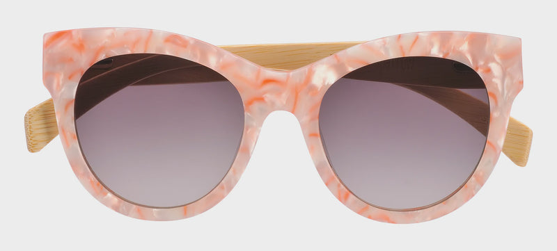 A pair of pink marble acetate sunglasses with smoky grey gradient lenses and natural bamboo temples.